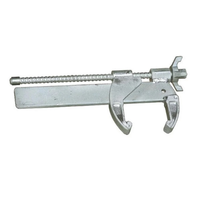 Універсальний затискач для опалубки